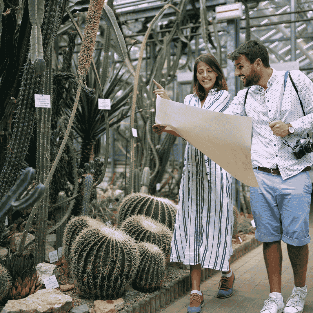 Visitors on a guided tour of thematic gardens at Sixteen Oaks Botanical Garden
